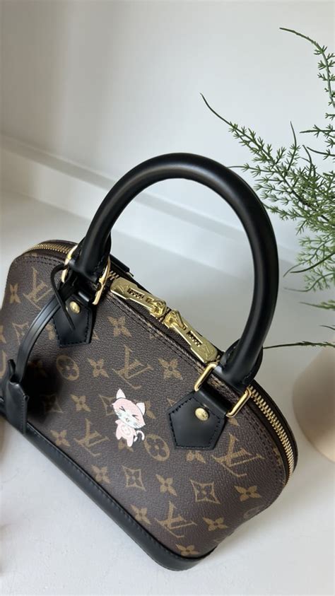 louis vuitton alma bb world tour black|lv alma bb monogram.